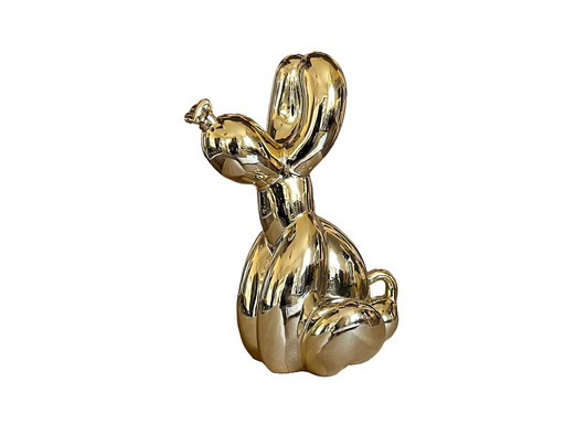 Sitzender Ballonhund in Gold