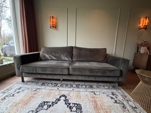 3-Sitzer Sofa mit Hocker. Grüner Samt