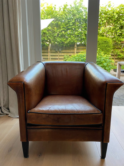 2 Club-Fauteuil aus Schaffell