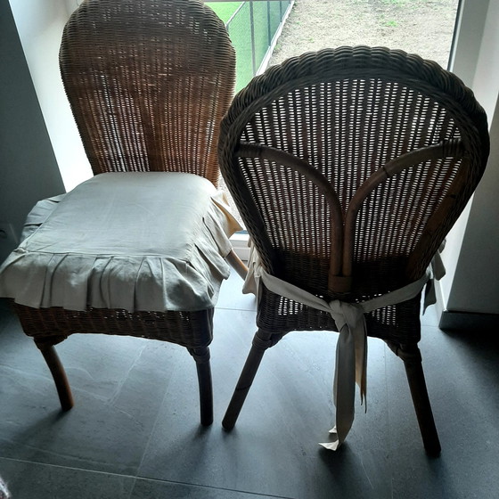 Image 1 of 4X Rattanstühle mit Kissen und 1X Rattantisch mit Glasplatte