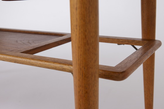 Image 1 of Dänischer ausziehbarer Couchtisch aus Teakholz