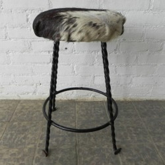 Image 1 of Vintage Hocker mit Kuhfell bezogen