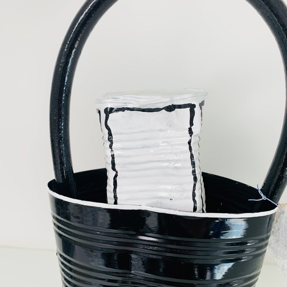 Image 1 of Kunstobjekt Norman Gekko - Zerquetschte Chanel-Tasche mit N.5-Parfüm