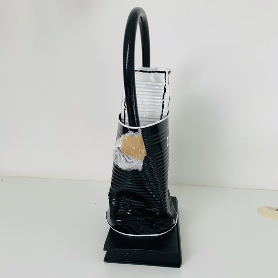 Image 1 of Kunstobjekt Norman Gekko - Zerquetschte Chanel-Tasche mit N.5-Parfüm