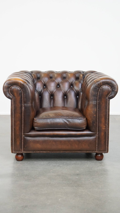 Chesterfield-Sessel aus dunklem Rindsleder