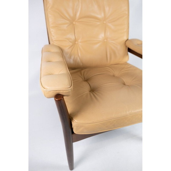 Image 1 of Vintage Sessel in dunklem Holz und mit Leder gepolstert, Dänisch 1960er