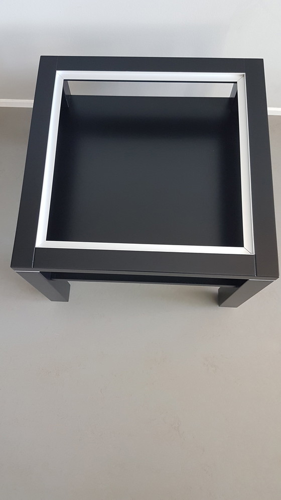 Image 1 of 2 Design Couchtische 90er Buche massiv Schwarz mit weißer Milchglasplatte