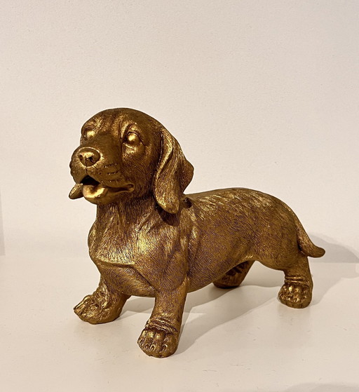 Goldener Dachshund Statue