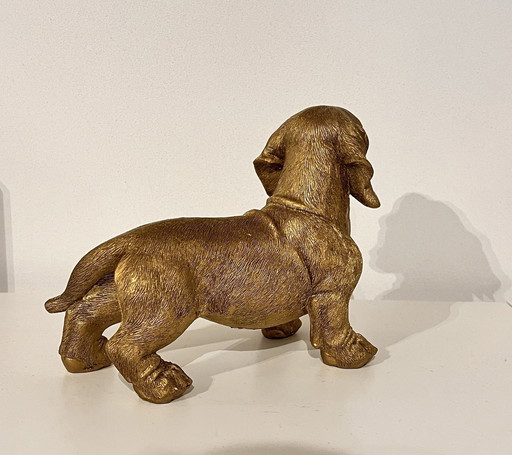 Goldener Dachshund Statue