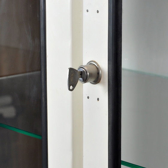 Image 1 of Vintage Arztschrank aus Glas & Eisen