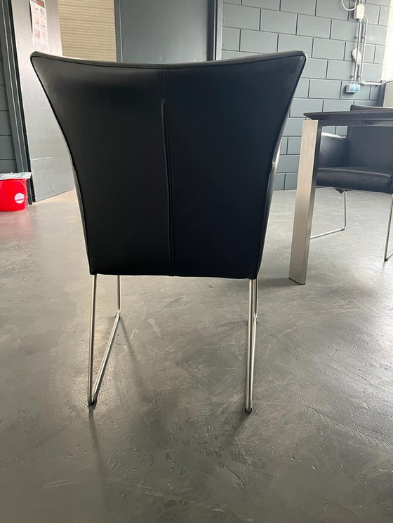 Image 1 of Esstisch mit Edelstahlbeinen und 6x Stühlen aus schwarzem Leder