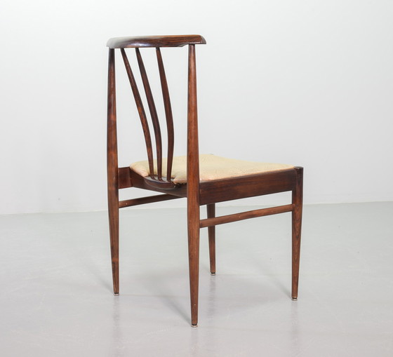 Image 1 of Skandinavisch Esszimmerstühle mit Spindelrücken aus massivem Palisanderholz und karamellfarbenem Kunstlederbezug. Vierer-Set, Ja